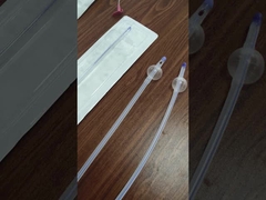 シリコンで覆われたラテックスフォリーカテーテル 泌尿器科手術のための3方向ダブルバルーン